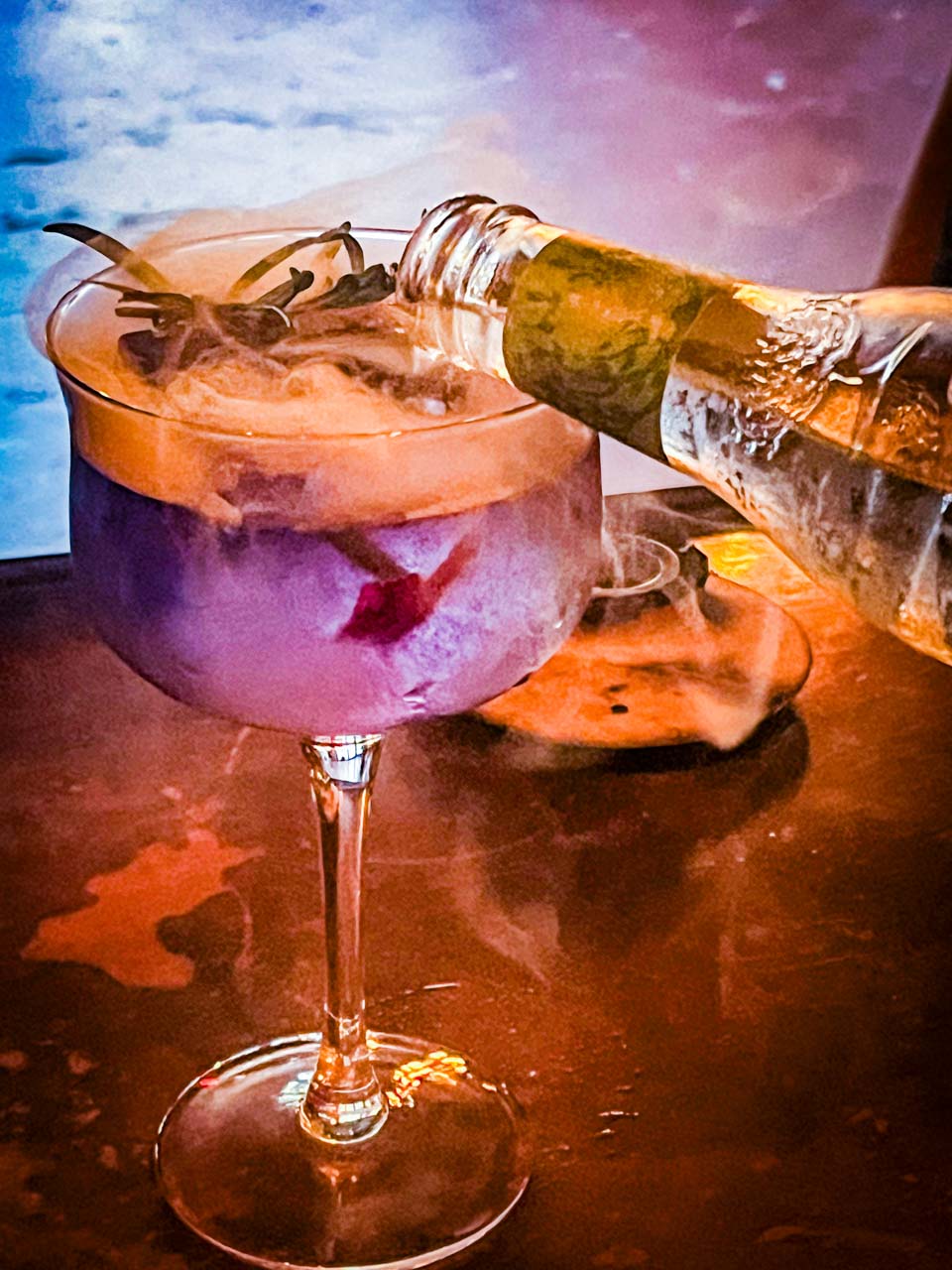 "Elena's Gin & Tonic" at Incanto in The Heights, Houston, featuring Empress Gin Elderflower 1901, Crème de Violette, Fever Tree Elderberry Tonic Water, and smoked rosemary.