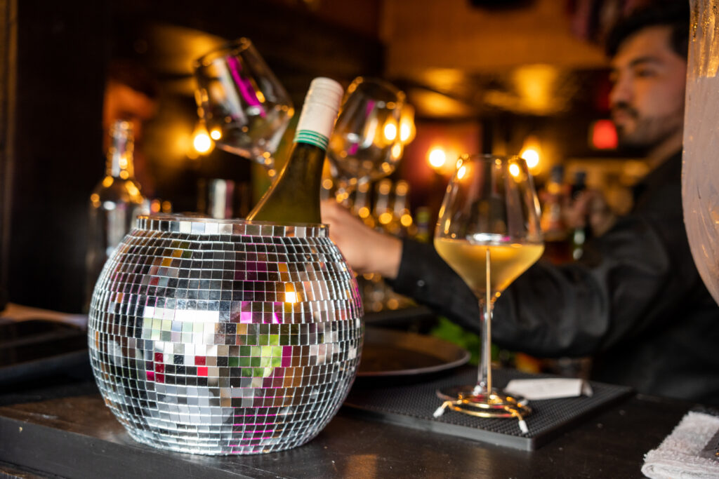 Holiday party venue in Houston Heights – Incanto cocktails served in disco ball and martini glasses