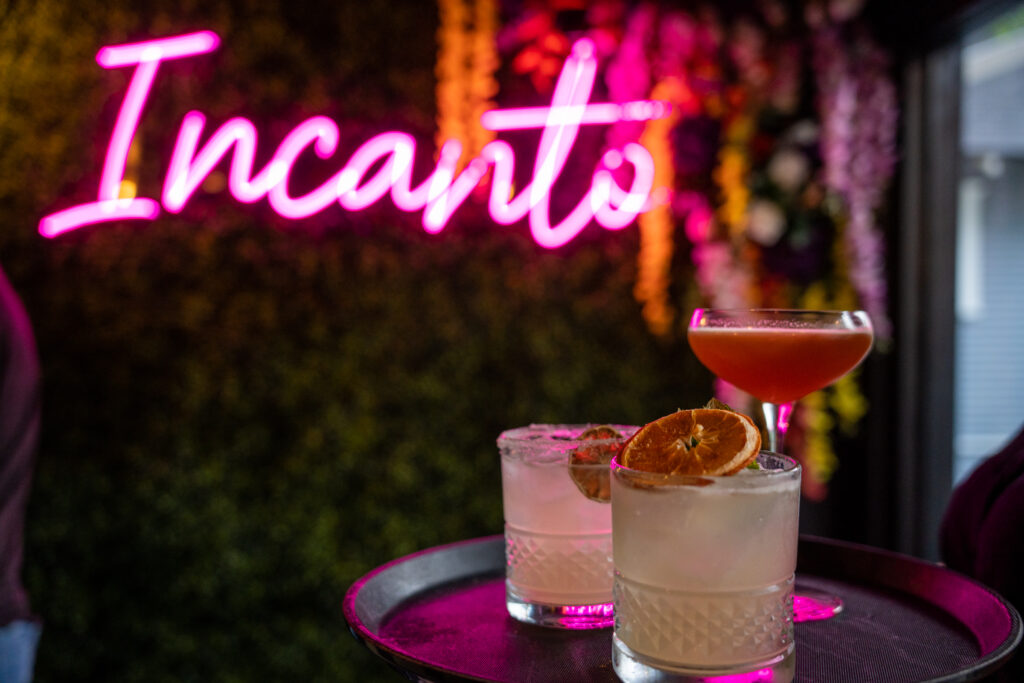 Craft cocktails served during happy hour at Incanto cocktail bar in Houston