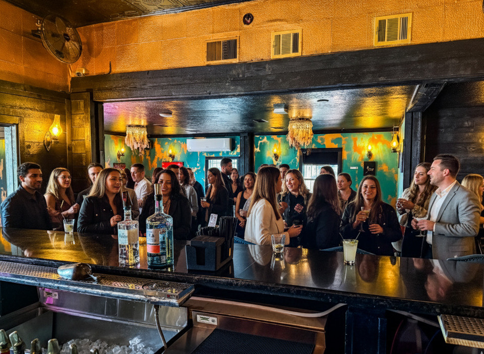 Incanto happy hour cocktails crowd enjoying drinks at bar in Houston Heights